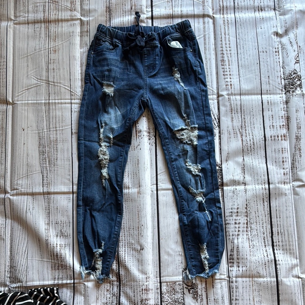 Distressed Blue Denim Jeans